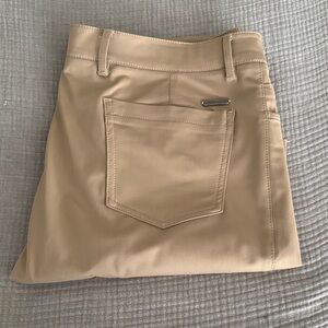Chic Tan Pants with Pocket Accent